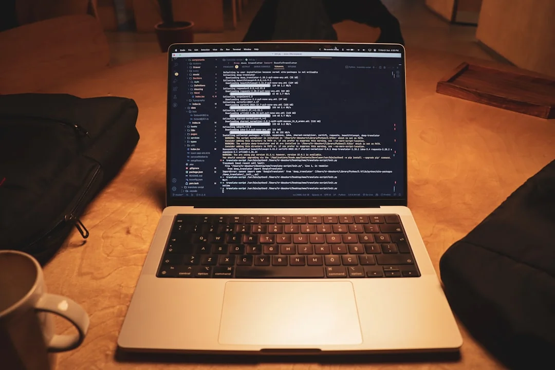 A sleek office desk setup featuring Apple devices: iMac, MacBook, and iPad.
